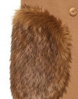 Cognac-colored vest with two fur pockets