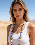 Lange Kette Runde Perlen Beige Goldfassung