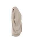 Gilet beige orné de boutons décoratifs dorés