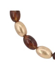 Collier perles cacao-doré
