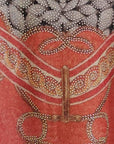 Pull beige/orange imprimé orné de strass