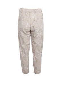 Pantalon beige imprimé fleurs blanches