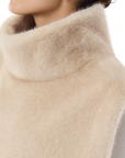 Poncho beige fausse fourrure col montant
