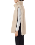 Poncho beige fausse fourrure col montant